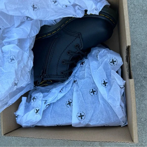 Dr. Martens toddler size 6 black boots. Brand new, never worn.